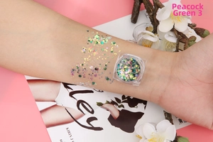 Peacock green glitter gel with mixed stars and sequins for festive eye and nail makeup