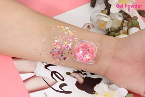 Jelly Pink 6 glitter gel with heart and star shapes applied on skin for makeup