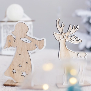 Nordic wooden Christmas ornaments featuring hollow angel and elk designs with warm LED lighting