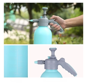 Detailed view of 2L hand pump sprayer with ergonomic handle and clear volume scale