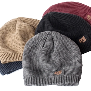 Detailed view of winter knit hats in five colors with maple leaf leather patches