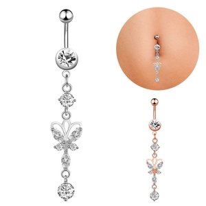 Detail view of butterfly navel rings with sparkling zircons in silver and rose gold finishes