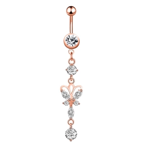 Detailed macro view of rose gold belly button ring with butterfly bow and clear zircons