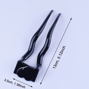 U-shaped black hair fork with heart detail and size markings showing 13cm length