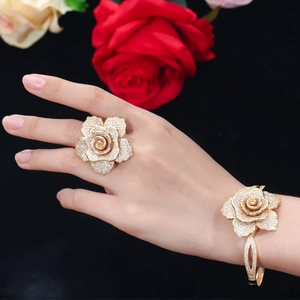 Luxurious gold-plated rose ring and bracelet set encrusted with sparkling zircons