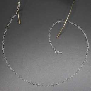 Minimalistische zweifarbige Brillenkette aus Metall mit verstellbaren Gummischlaufen
