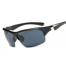 Streamlined black sports sunglasses with gray lenses showing metallic side frame details