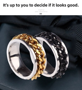 Close-up of rotatable chain rings in silver with gold and black stainless steel finish