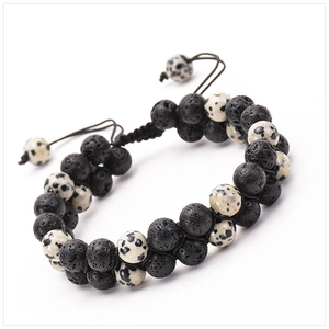 Detail view of double-layer lava rock and spotted jasper beads with adjustable braided cord