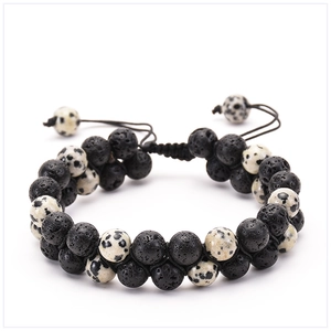 Close-up of double-layer lava stone and jasper beaded bracelet with adjustable cord