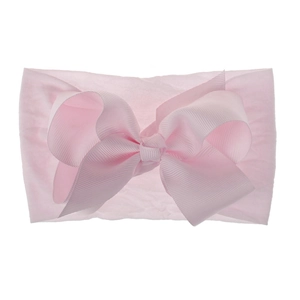 Detailansicht eines weichen rosa Nylon-Stirnbands mit großer Schleife für Kleinkinder