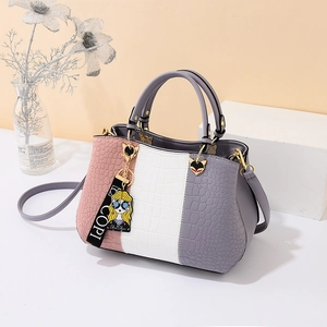 Women's tricolor faux crocodile leather tote bag in pink, white and grey with charm