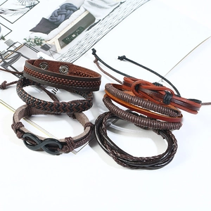 Men's vintage layered leather bracelet set featuring braided ropes and infinity charm