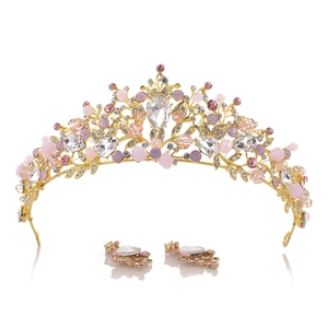 Baroque bridal jewelry set featuring a gold crystal crown and matching drop earrings