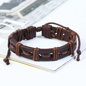Close-up of dark brown woven leather bracelet with adjustable knotted rope detail