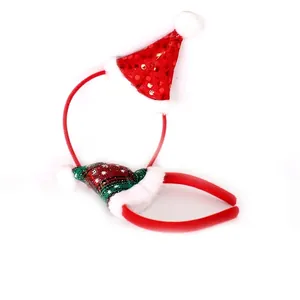 Set of two festive Christmas headbands featuring sequined and plaid mini Santa hats