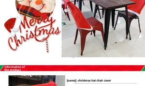 Close-up of red Santa hat chair cover with snowman detail and white pom-pom trim