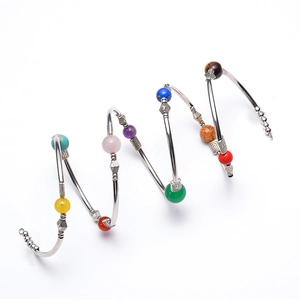 Multilayer spiral bracelet featuring natural turquoise and colorful beads in silver finish