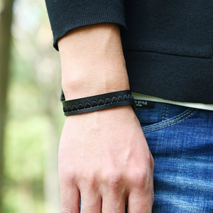 Minimalist black braided leather bracelet for men with woven texture and heart embroidery