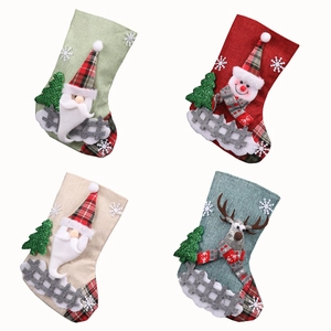 Set of four 3D Christmas stockings with Santa and Reindeer designs on white background