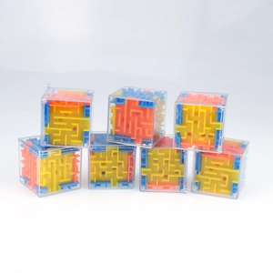 Detailed view of seven 3D cube mazes with colorful internal tracks and metal rolling balls