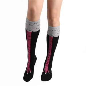 Close-up of novelty chicken feet pattern knit high socks with detailed pink bird claws