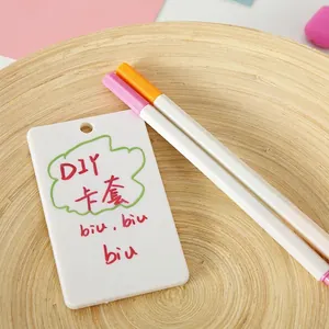 White DIY ABS plastic card holder with round lanyard hole and colorful markers