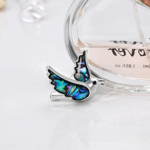Exquisite bird brooch with natural colorful abalone shell in polished silver finish