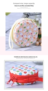 Mini round storage cases for earphones featuring colorful smiley faces and Halloween patterns