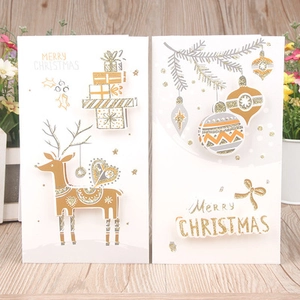 Detail of 3D Merry Christmas cards with gold glitter reindeer and gift box designs