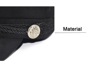 Detail of military cap with silver anchor button and black braided rope trim
