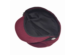 Detail showing black satin lining and interior craftsmanship of burgundy military cap