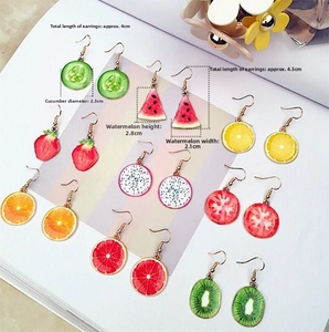 Detailed view of assorted fruit charm earrings with measurements and acrylic textures