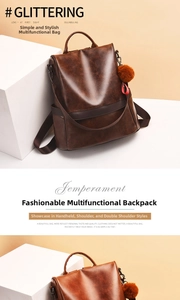 Detail of vintage brown PU leather backpack with multiple carrying ways and plush charm