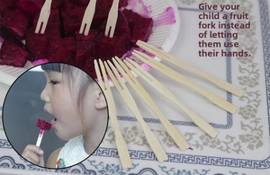 Eco-friendly bamboo fruit forks with heart shape detail used for dragon fruit snacks