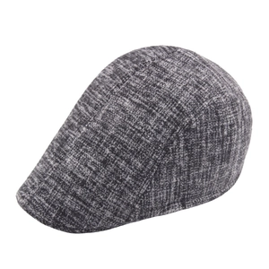 Classic grey and black wool flat cap featuring a fine tweed texture and warm cotton lining