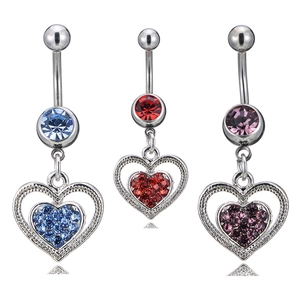 Three silver heart belly rings with blue, red, and purple crystals on white background