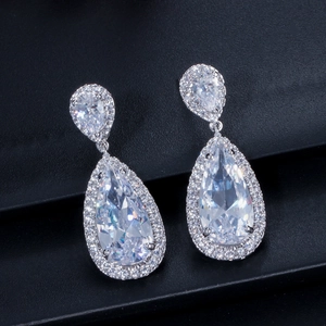 Classic silver teardrop earrings with halo-set pear-shaped cubic zirconia crystals