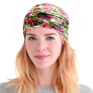 Close-up of bohemian floral print wide elastic headband worn by a female model