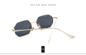Detailed 180-degree side view of geometric octagonal sunglasses with gold metal frame