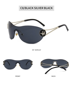 Détail de lunettes Y2K avec verres noirs C8 et accents métalliques en forme d'étoile