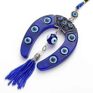 Lucky Turkish blue evil eye horseshoe hanging ornament with decorative woven tassel