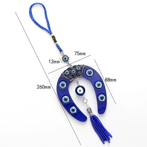 Detailed dimensions of the blue evil eye horseshoe hanging ornament with silk tassels