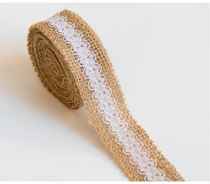 Detail of natural burlap ribbon with white lace edges for Christmas DIY and gift wrapping