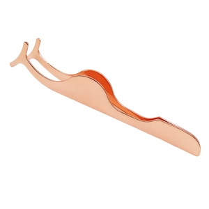 Rose gold curved stainless steel eyelash applicator tool on white background