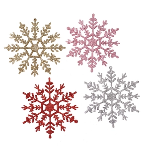 Set of four 12cm glittery plastic snowflakes in gold, pink, red, and silver for Christmas trees