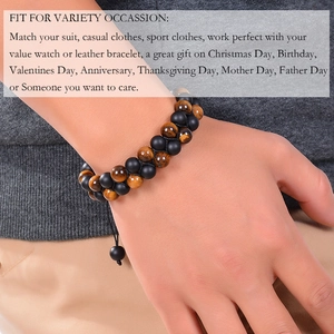 Detail of double-layer bracelet with 8mm tiger eye and matte black beads on wrist