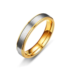 Two-tone matte silver and gold minimalist ring with zirconia in a professional studio shot