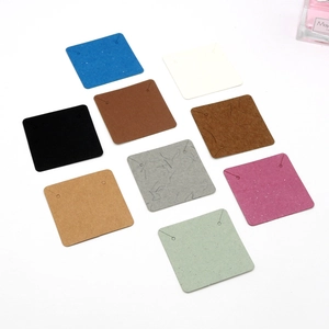 Square cardboard jewelry display cards for earrings and necklaces in multiple colors