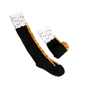 Close-up of creative chicken leg pattern socks with vibrant orange and black knit detail